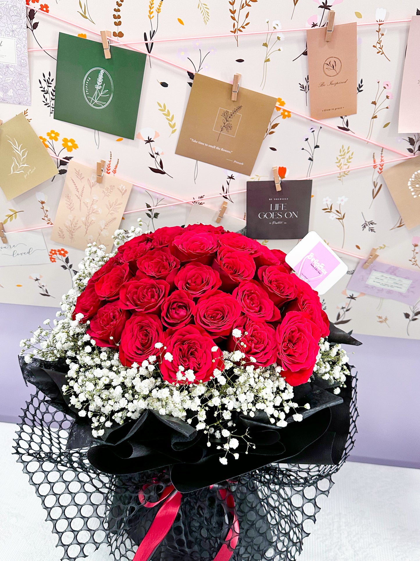 34 Stalk red Roses with baby breath