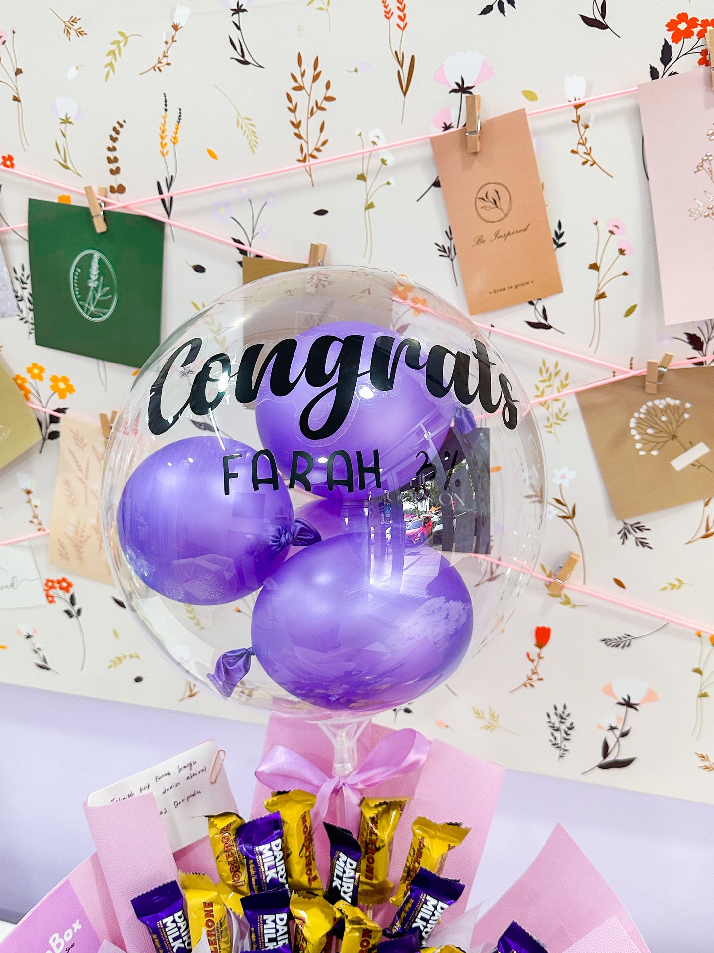 Cadbury & Toblerone bouquet with bobo baloons