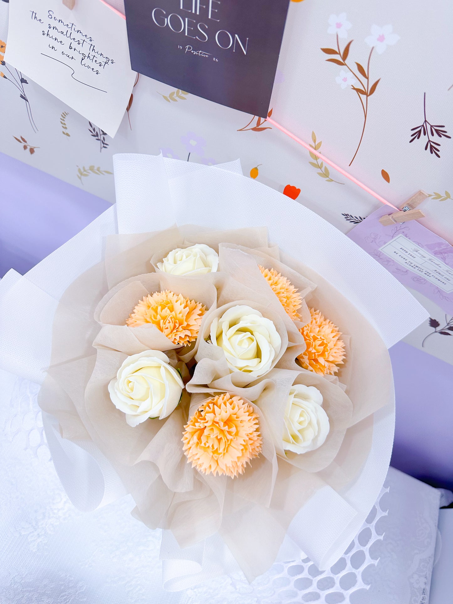 Orange carnation and White Soap rose bouqet