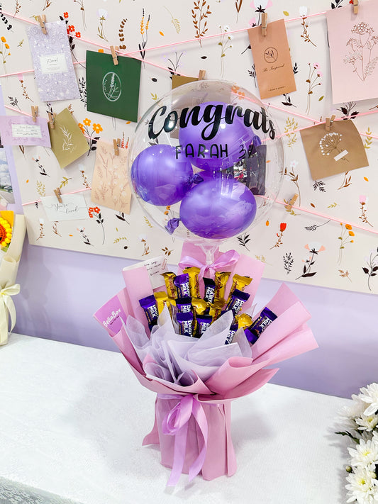 Cadbury & Toblerone bouquet with bobo baloons