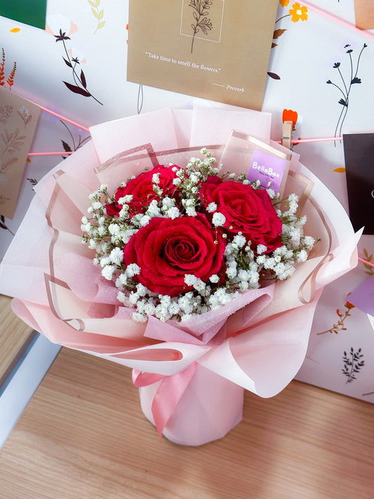 3 stalk red roses with white baby breath